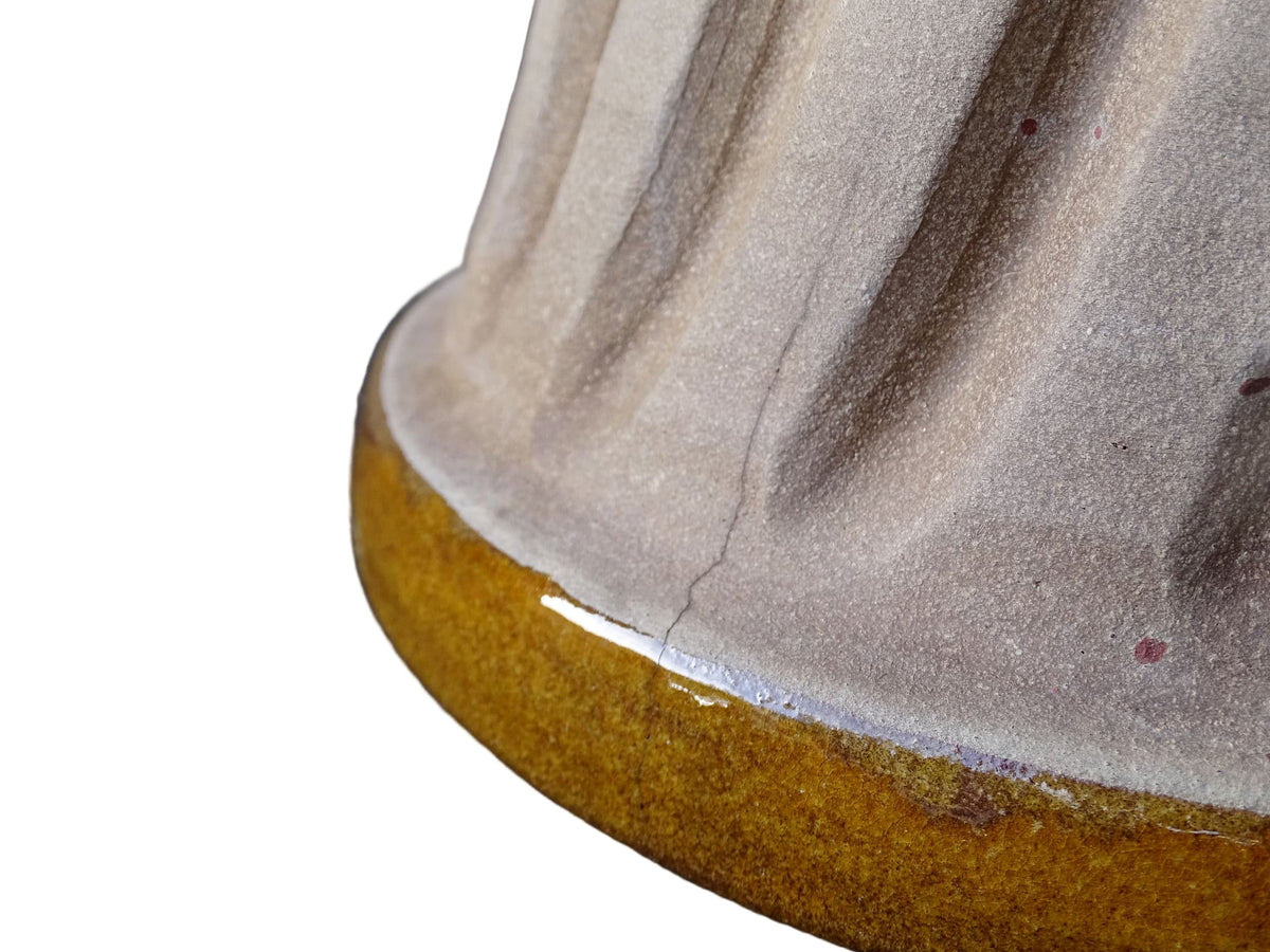 French vintage ceramic mould with a yellow glaze interior and unglazed exterior.