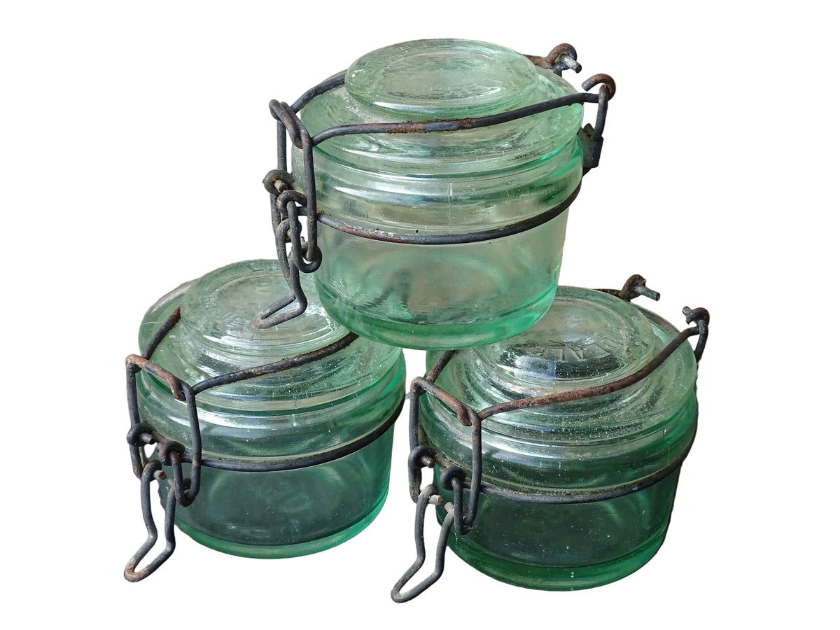 French vintage green glass jars by L'Ideale with metal clasps. Canning or preserving jars with lids.