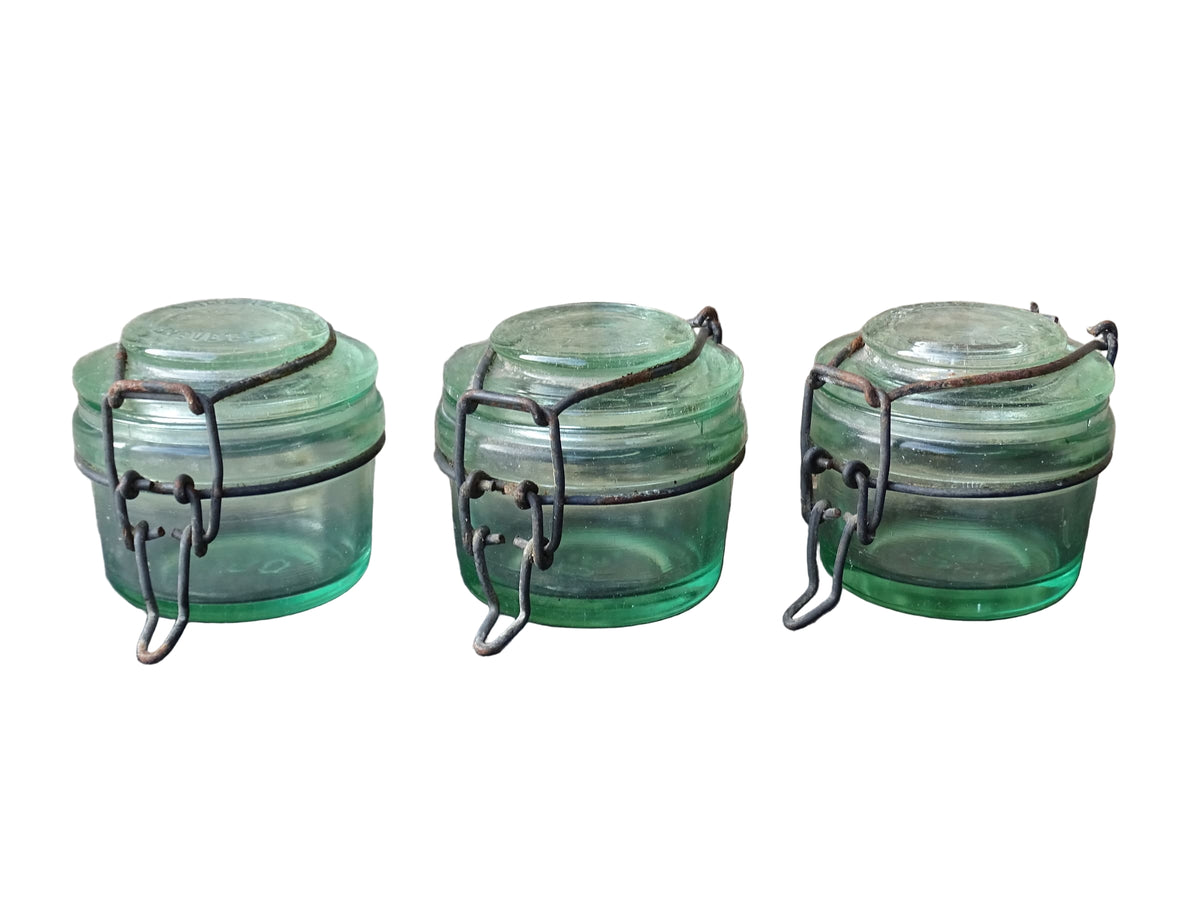 French vintage green glass jars by L'Ideale with metal clasps. Canning or preserving jars with lids.