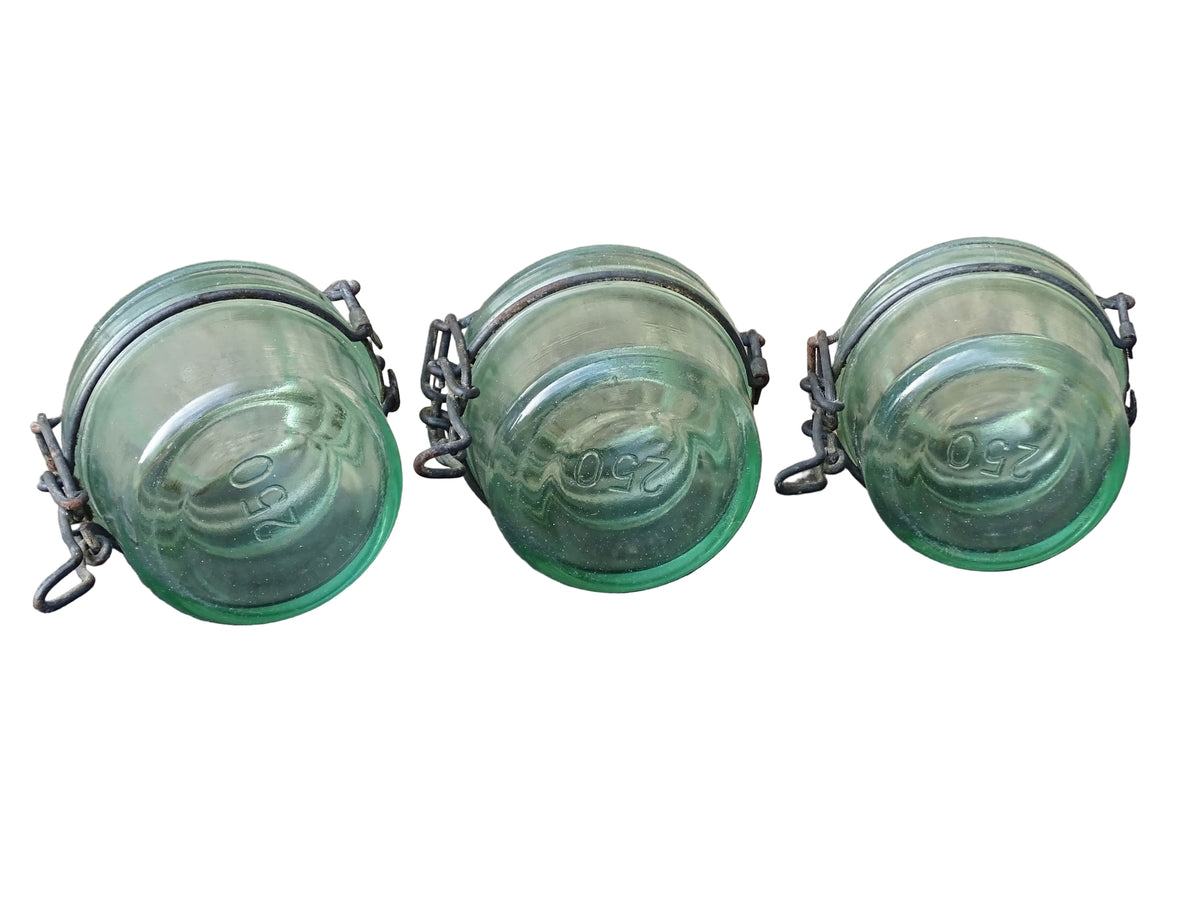 French vintage green glass jars by L'Ideale with metal clasps. Canning or preserving jars with lids.