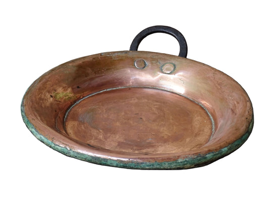 French antique copper pan with a wrought iron handle.