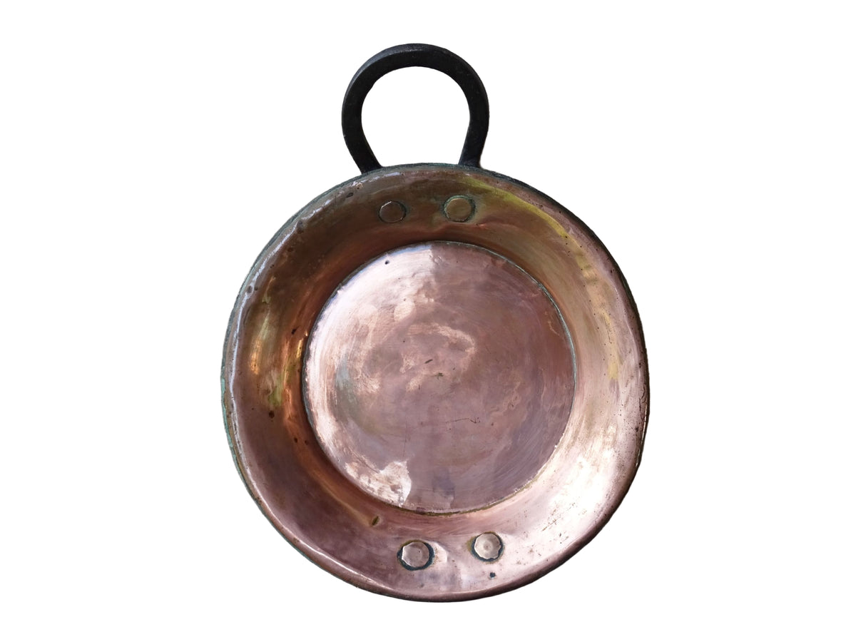 French antique copper pan with a wrought iron handle.