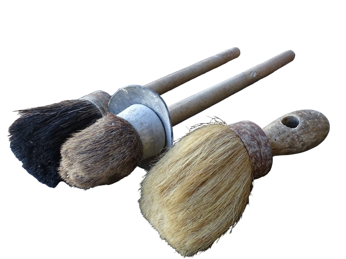Three old French vintage paint brushes with wooden handles and horse hair brushes.