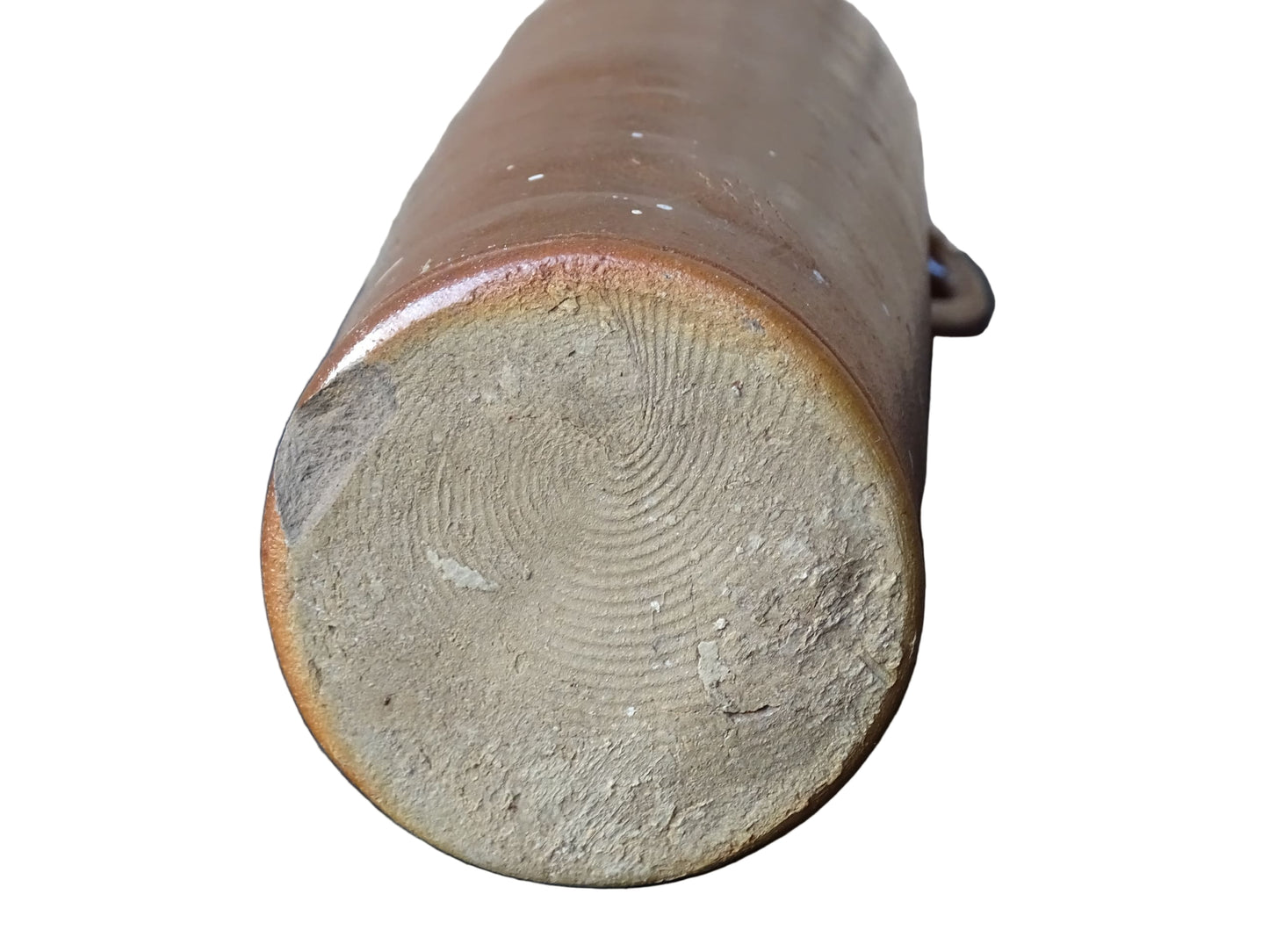 Antique salt glazed stoneware bottle, with a raised lion medallion on the shoulder and a loop handle. Bottle with textured surface and deep brown glaze.