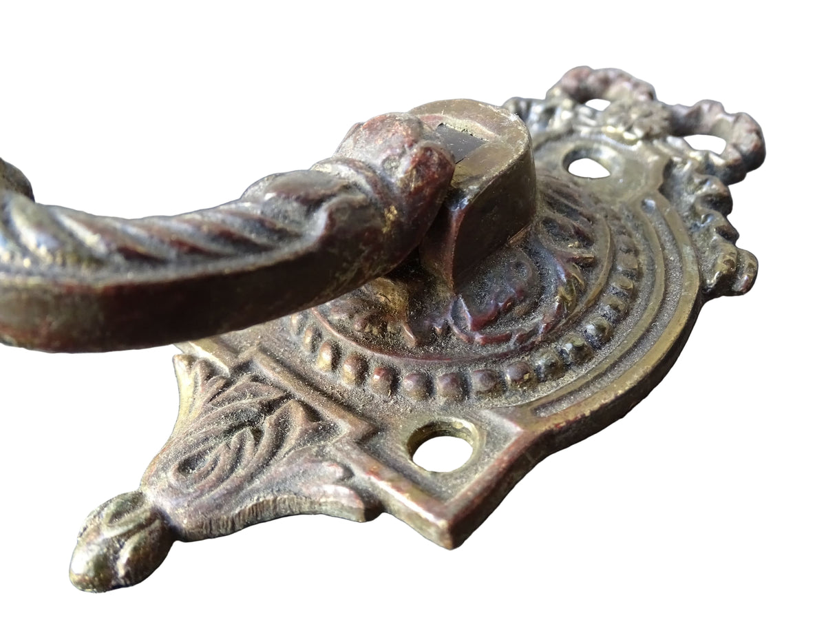 Pair of French antique gilt bronze drawer pulls with ribbon detailing, signed L.Pinet. Nineteenth century ormolu handles.