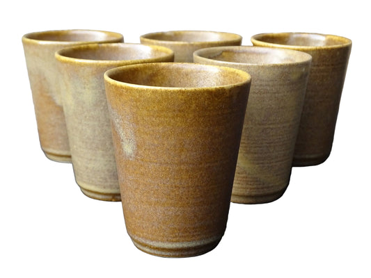 Set of six rustic vintage stoneware cups or pottery tumblers by Digoin in neutral tones.