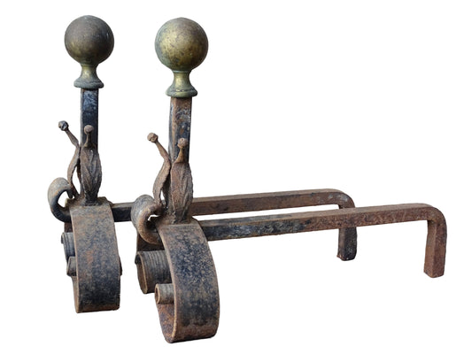 Pair of French antique wrought iron andirons or firedogs with brass finials.