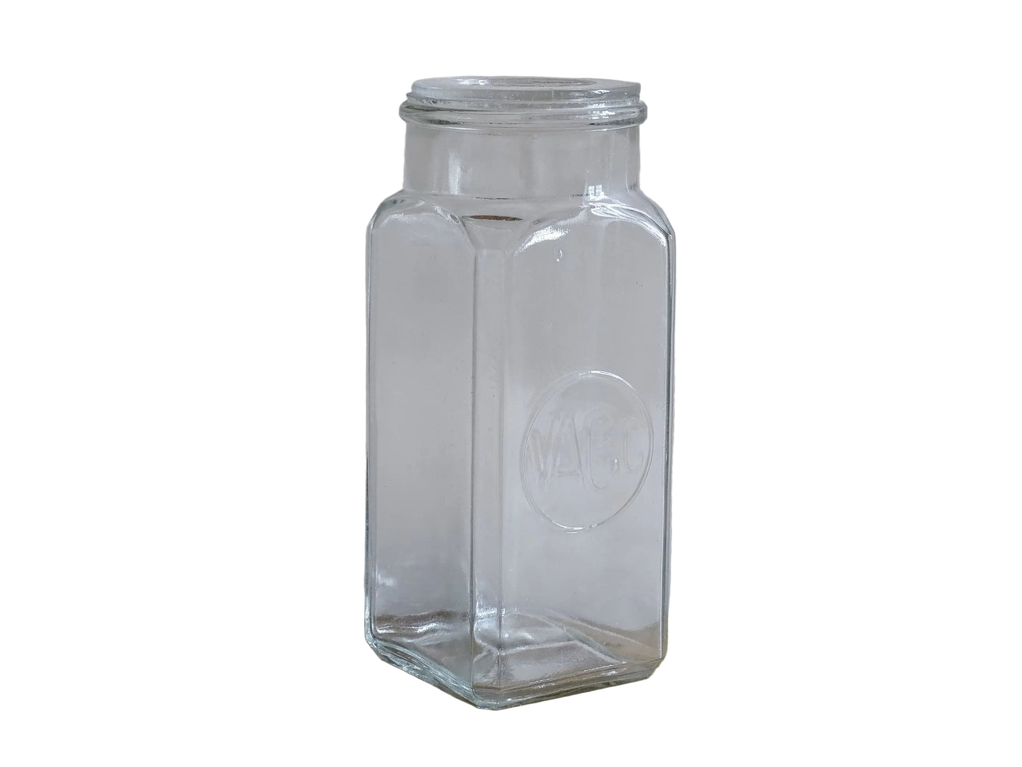 A French antique glass épicerie jar with original lid. Dating to circa 1920. It is made beautiful, thick pressed glass, embossed with the maker's name to the front and "Facile" to the top of the lid.