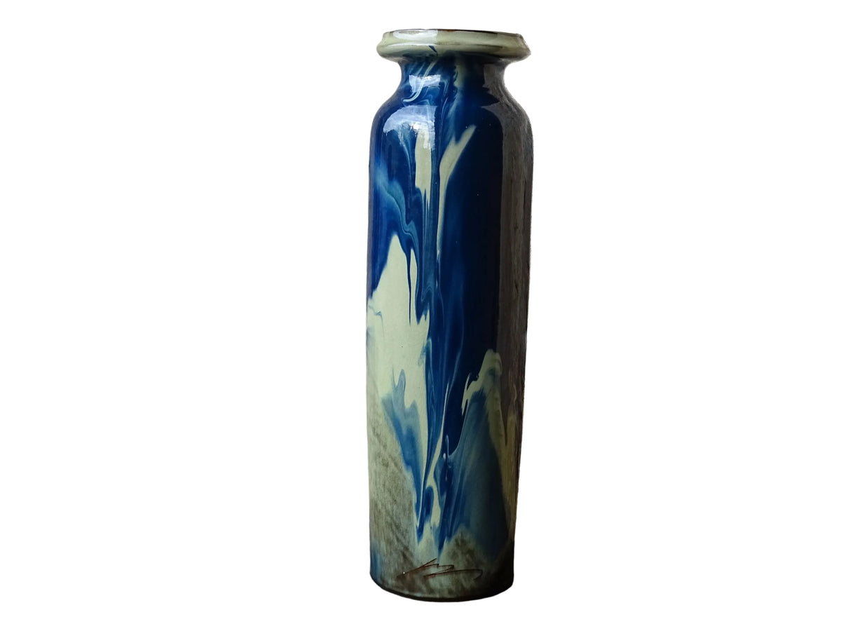 Vintage ceramic vase with a blue and cream glaze. Tall glazed terracotta vase, signed.