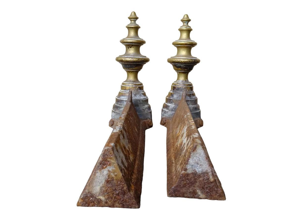 Pair of French antique brass andirons or firedogs with turned forms and cast iron backs.