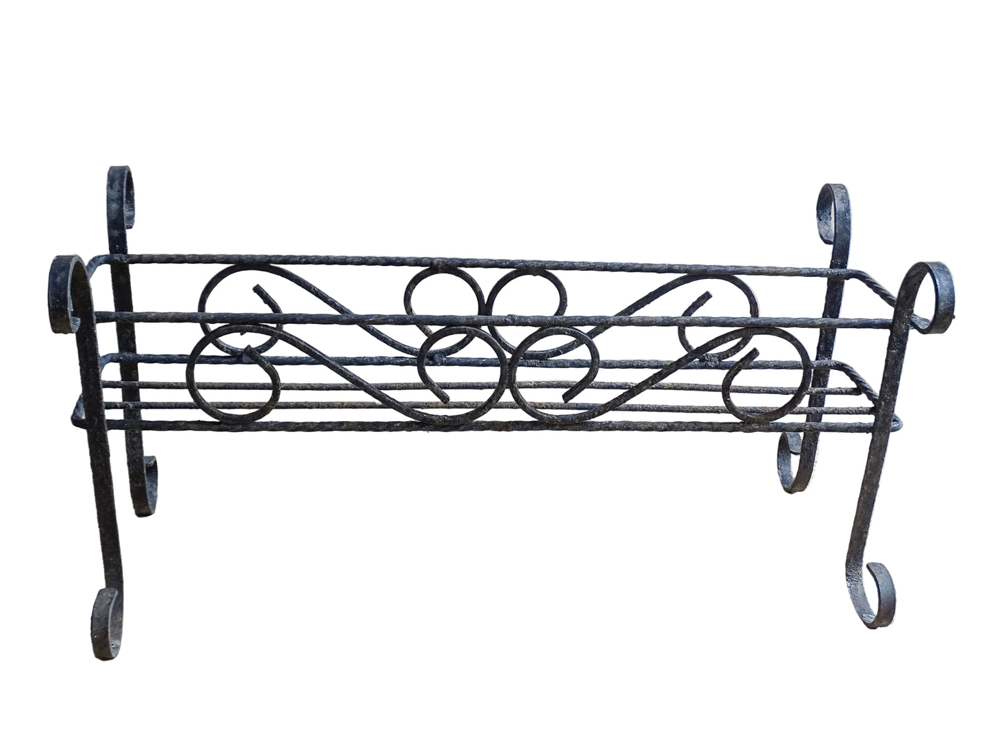 French vintage wrought iron plant stand. A mid century plant stand, with a wide central basket and curved detailing. It would make a gorgeous decorative accent both indoors or outdoors.
