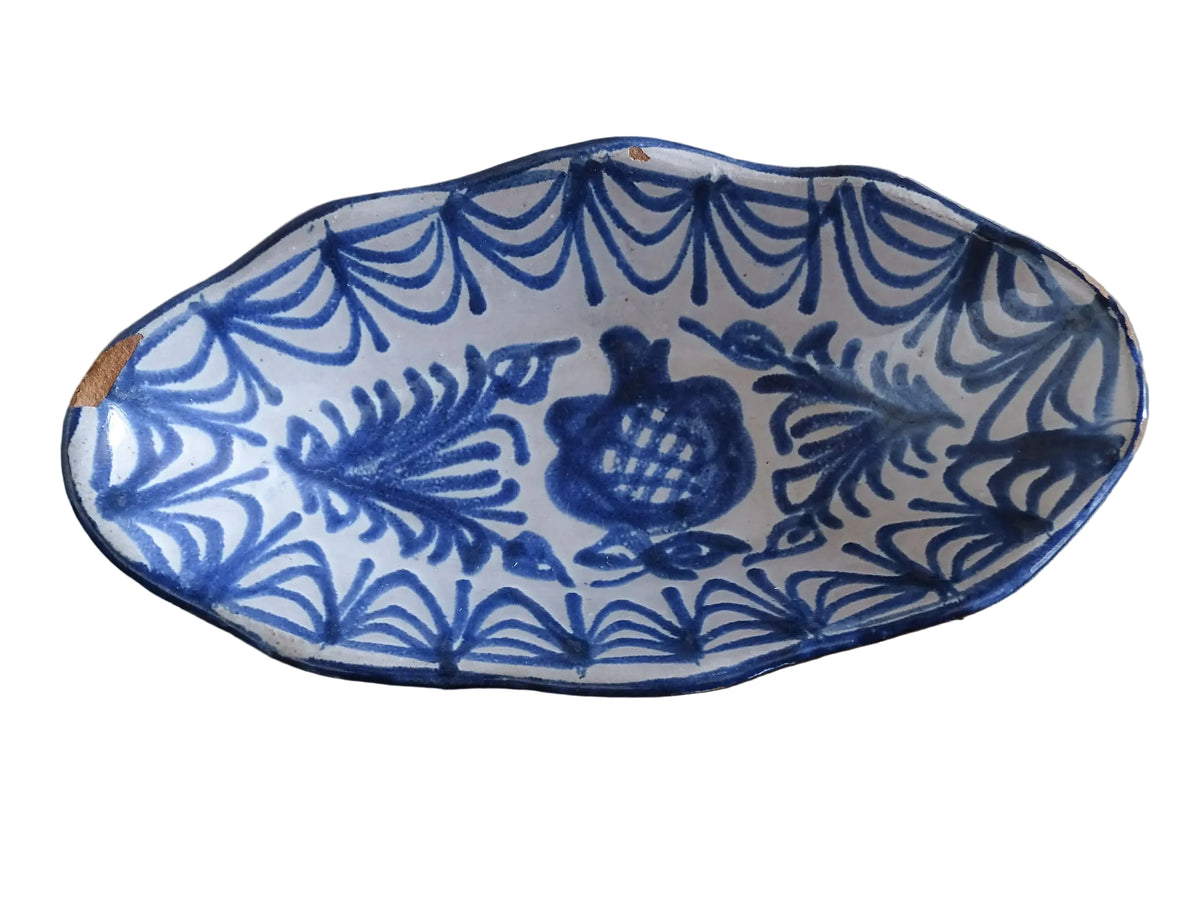 A small Spanish vintage Fajalauza pottery trinket dish or bowl. Hand painted in blue. This beautiful terracotta piece has a pomegranate to the centre.