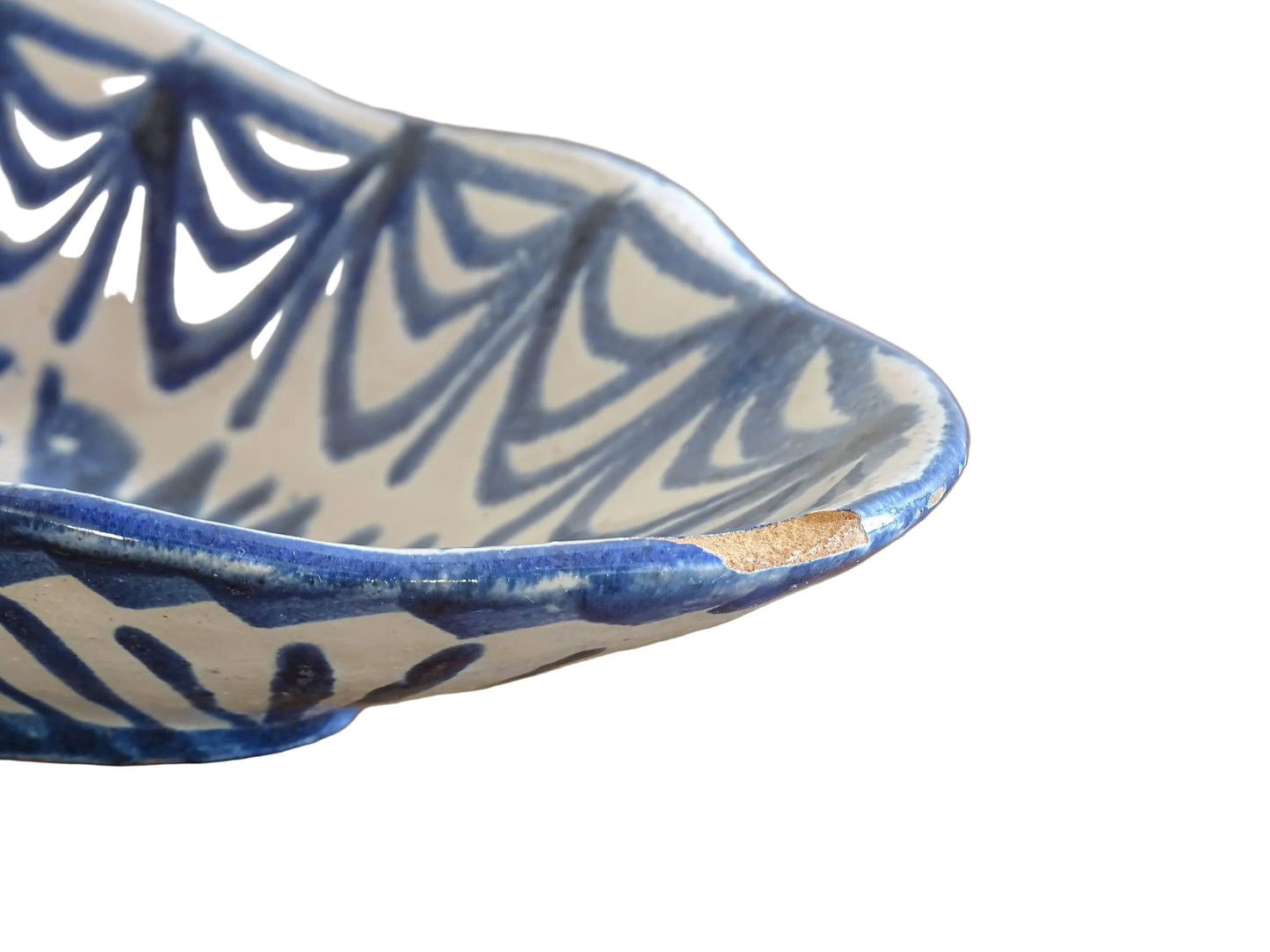 A small Spanish vintage Fajalauza pottery trinket dish or bowl. Hand painted in blue. This beautiful terracotta piece has a pomegranate to the centre.