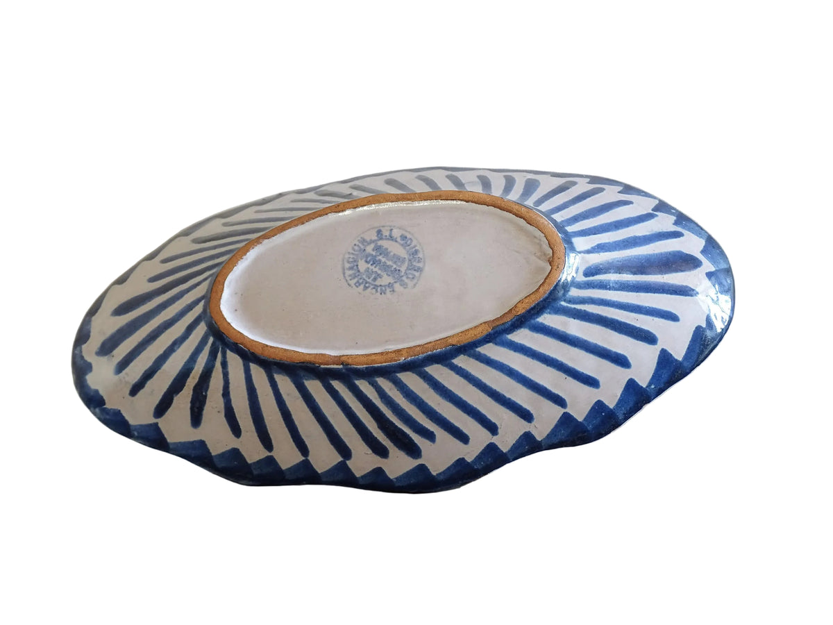 A small Spanish vintage Fajalauza pottery trinket dish or bowl. Hand painted in blue. This beautiful terracotta piece has a pomegranate to the centre.