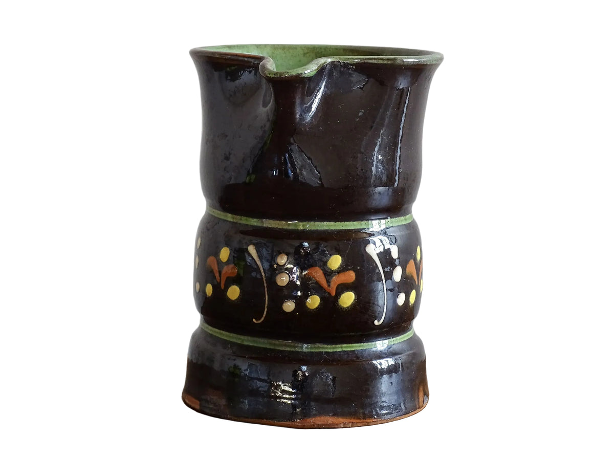 Beautifully rustic French vintage ceramic jug. It has a deep brown glaze and hand-painted decoration . This pottery jug is from Alsace.