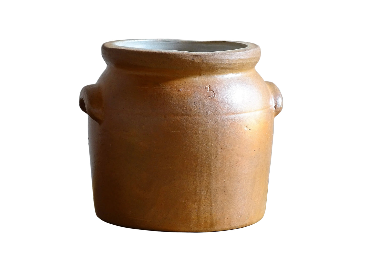 A French antique stoneware confit pot with a brown glaze. This salt glazed pottery cache pot dates to the early 20th century and would look amazing as part of a rustic French farmhouse style home.