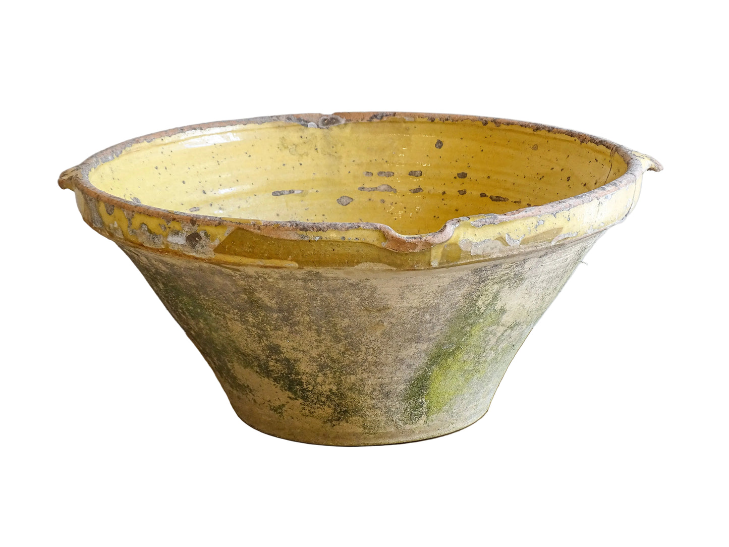 Large antique French confit bowl or gressalle with a yellow glaze to the inside and an unglazed exterior. This terracotta bowl, also known as a tian bowl, has a beautiful patina and originates from South West France.