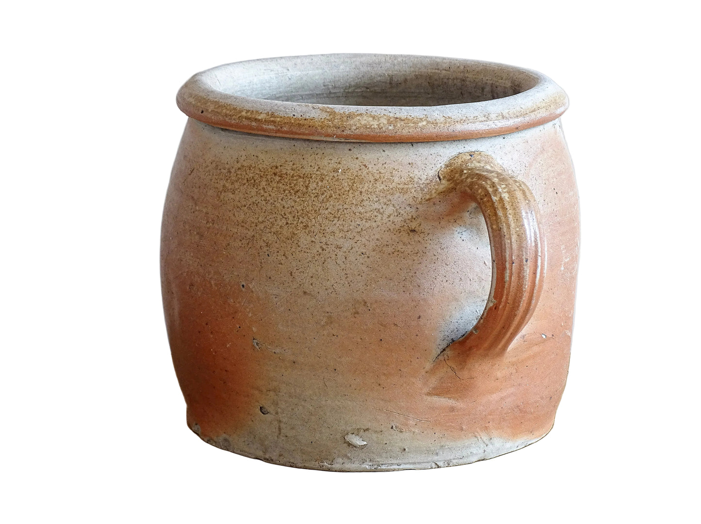 French antique stoneware jar with handle . This old confit pot with the colours of warm terracotta to pale hues is unglazed. It dates to the early 20th century.