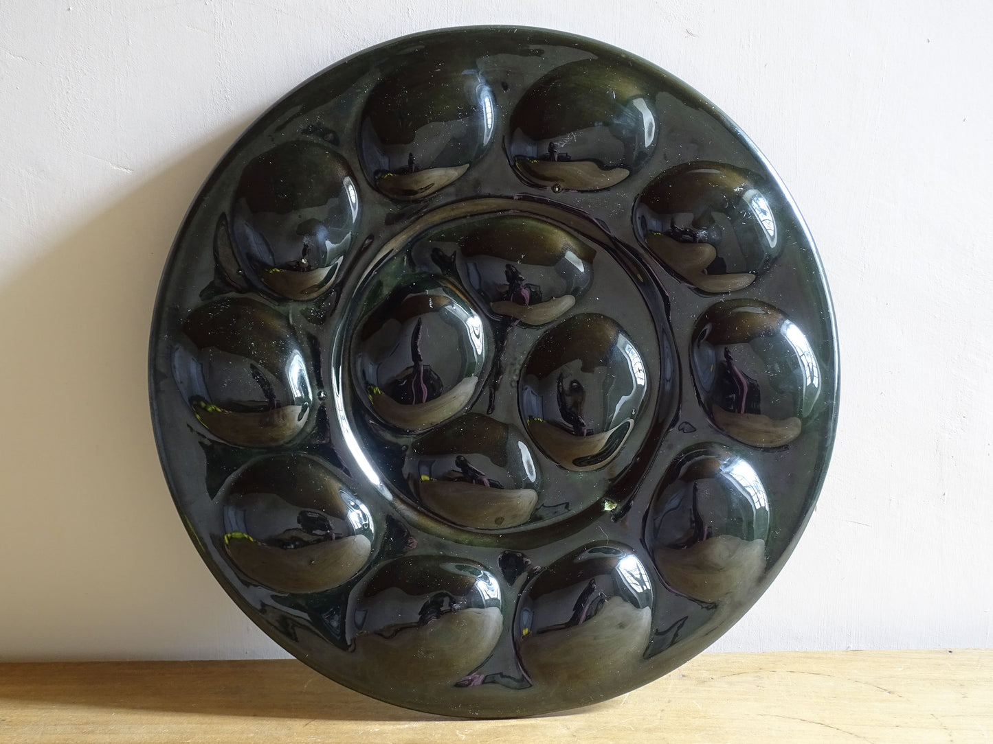 Underside of vintage St Clément French ceramic oyster plate showing maker’s mark.