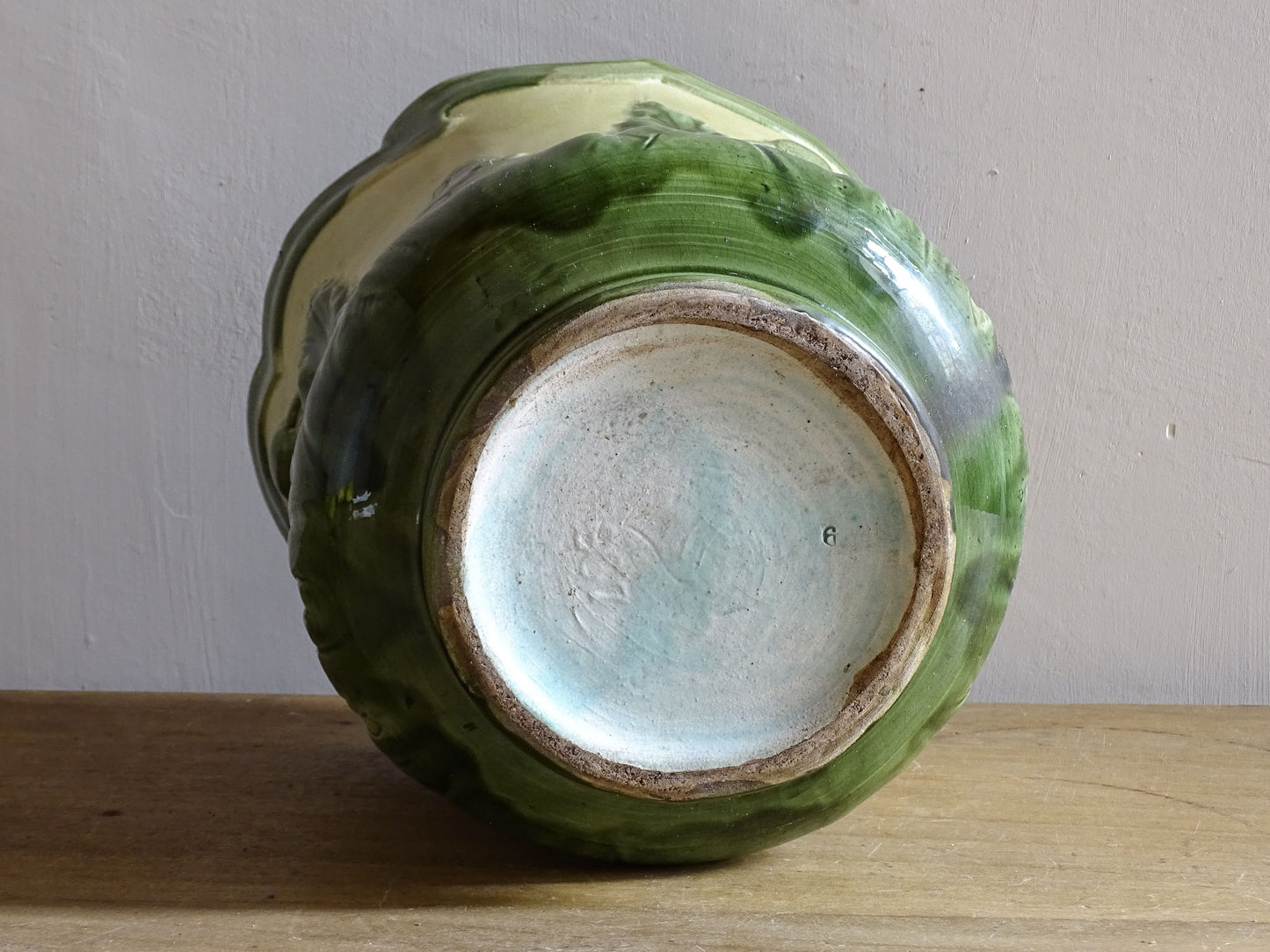 Early 20th century European ceramic cache pot with botanical design