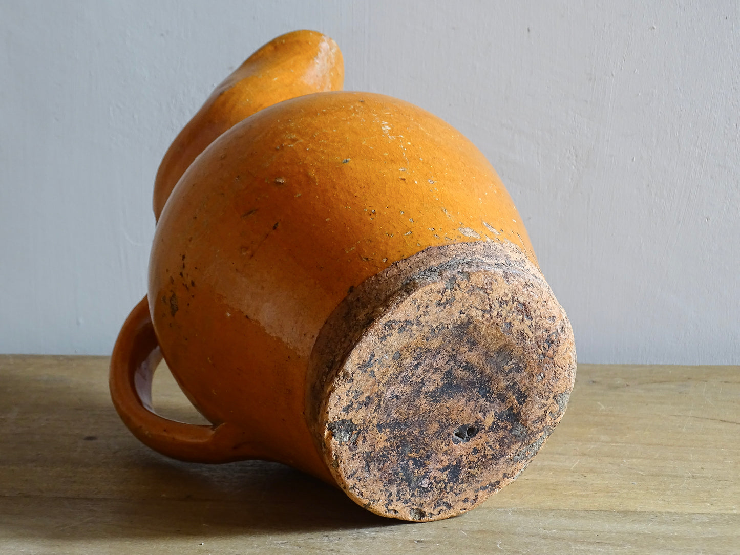 Handmade French antique cruche with rounded body and spouted lip