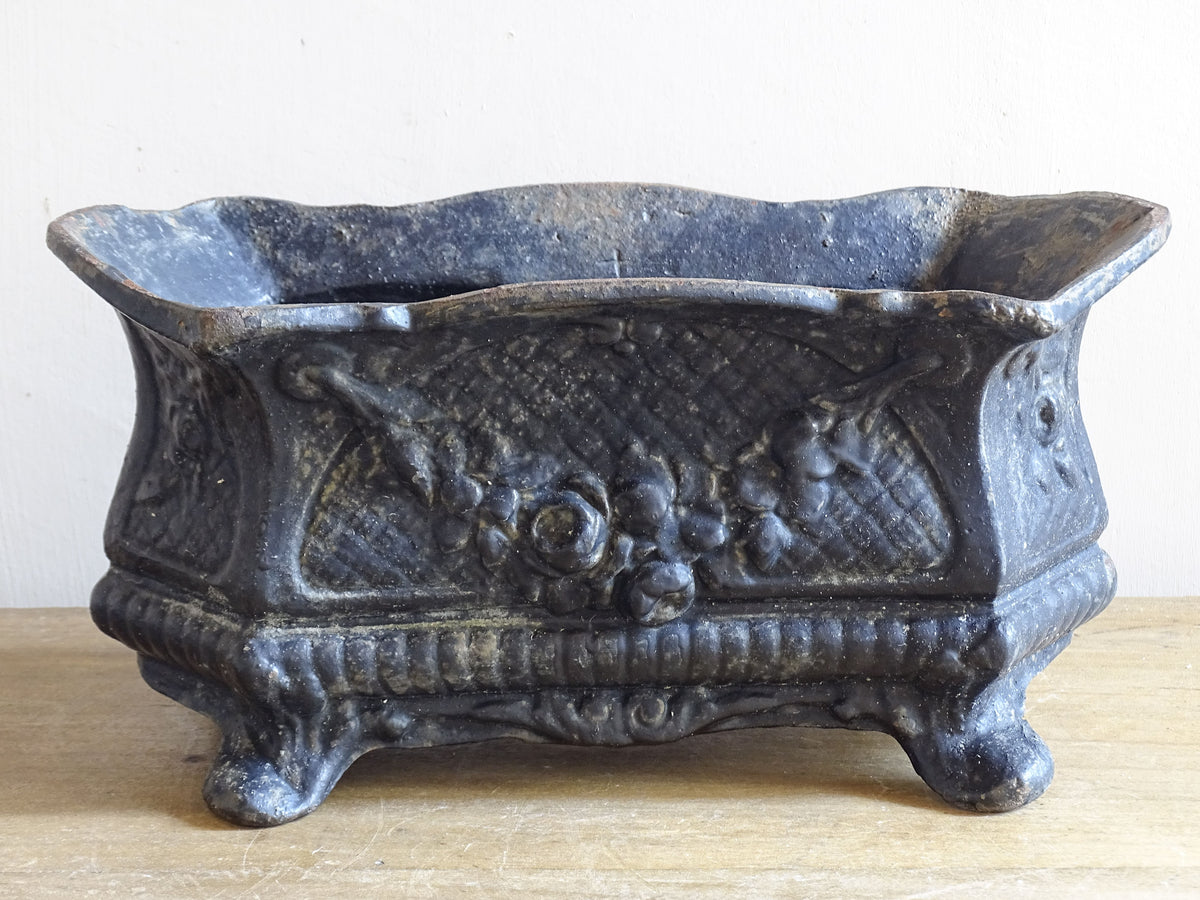 Late 19th century French cast iron jardinière with relief decoration