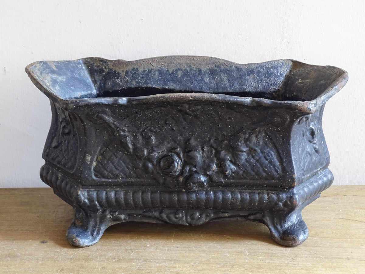 Small French cast iron planter with garland and floral rosette detail
