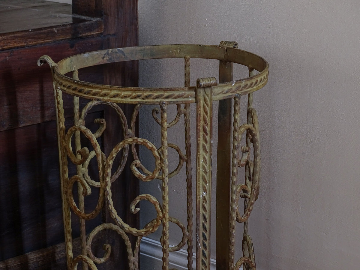 Vintage French painted metal umbrella stand with twisted scroll design