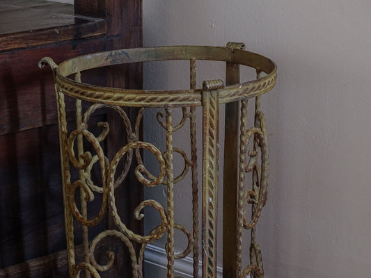 Vintage French painted metal umbrella stand with twisted scroll design