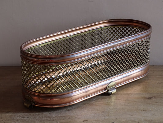 Vintage brass and copper mesh planter with oval mid-century design