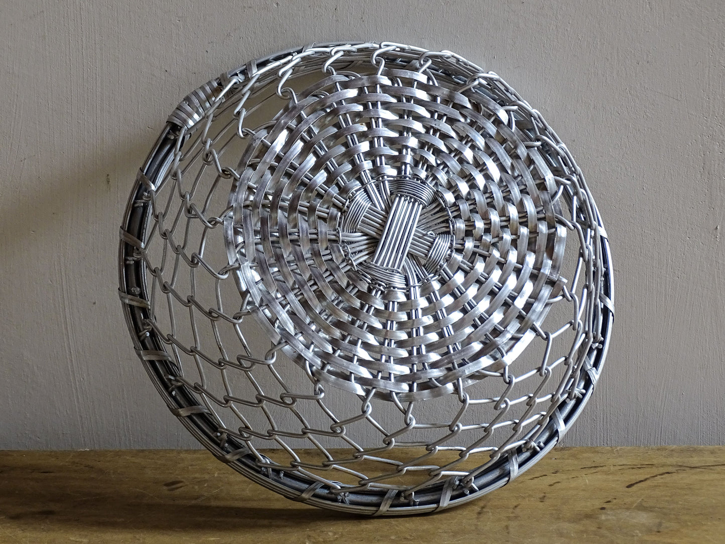 A French vintage silver coloured, round, wire basket.
