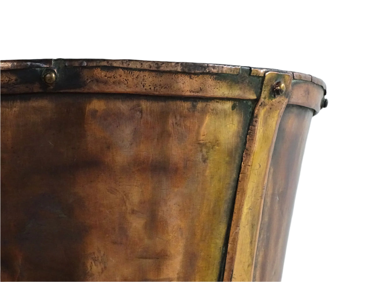 Large antique French copper pail with aged finish, originally used as a water vessel, shown on a plain white background.