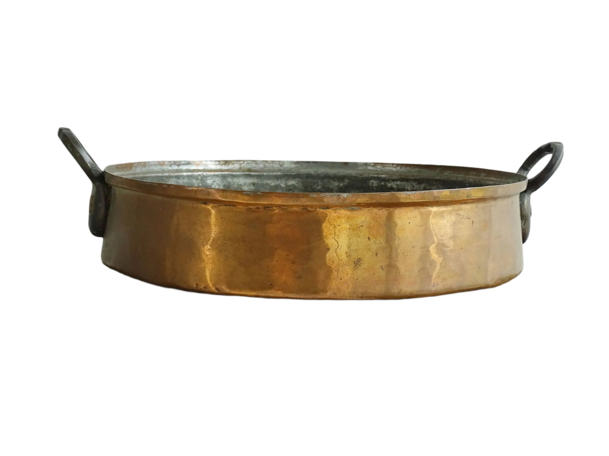 French antique copper pan with two handles and tinned interior. Round copper gratin pan.