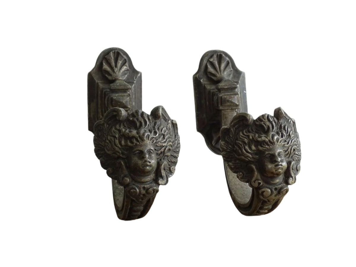 Pair of Antique French Curtain Hooks with Faces
