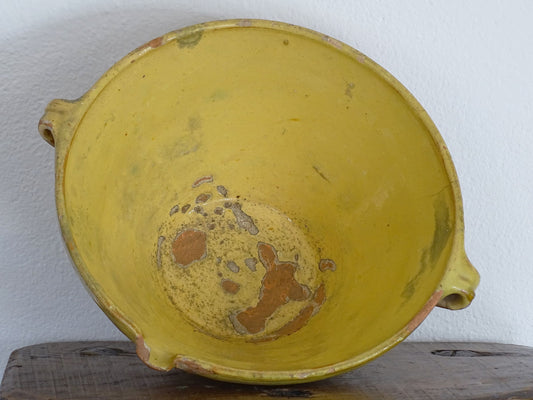 Antique French Tian Bowl with Yellow Glaze, the Earthenware Terracotta bowl or confit bowl has patina and an unglazed exterior