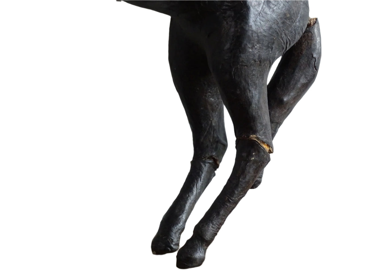 Distressed antique leather horse figurine for vintage shelf decor