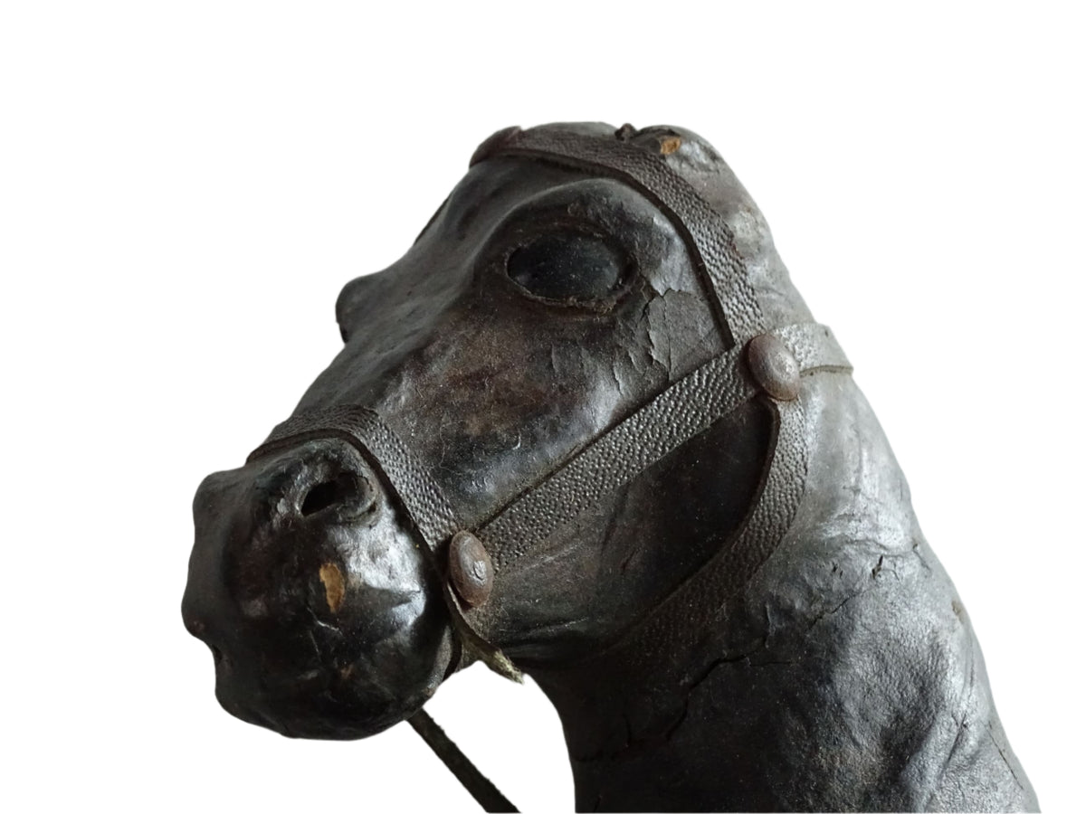 Distressed antique leather horse figurine for vintage shelf decor