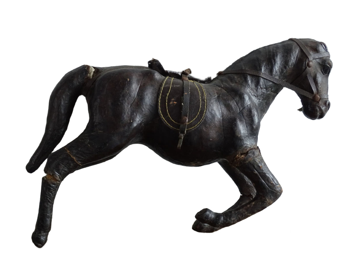 Distressed antique leather horse figurine for vintage shelf decor
