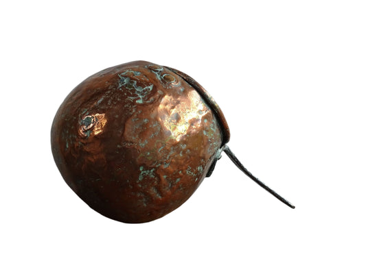 French antique copper zabaglione pan with a curved base, rustic dents, and a rich patina, ideal as a copper kitchen accent in a French farmhouse kitchen, displayed hanging or on a shelf alongside vintage cookware.