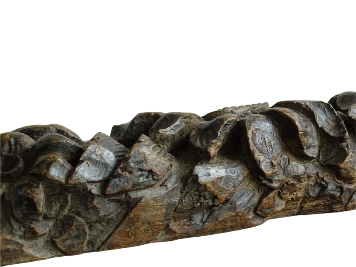 French antique wooden carving with sunflowers and roses. Old wood carving for display.