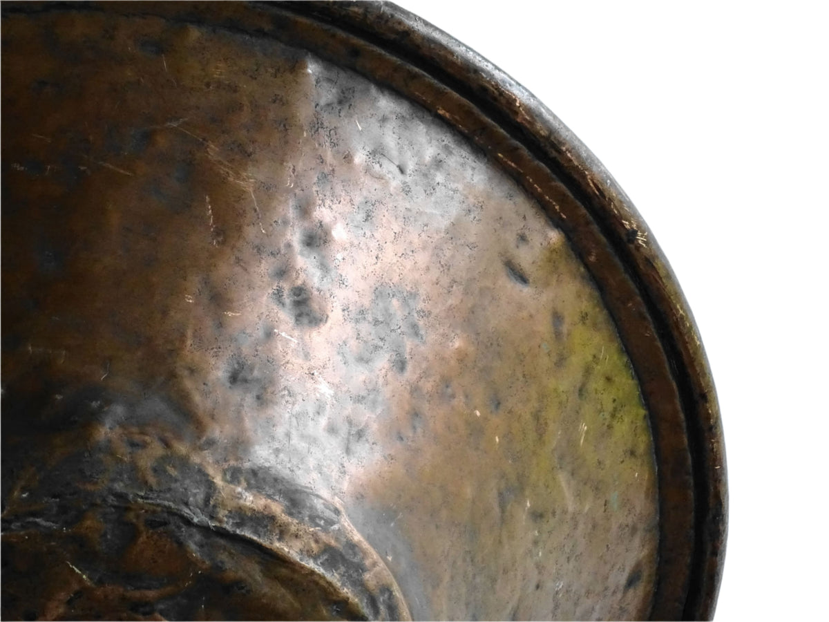 Large French antique copper bowl, it has an aged exterior with a warm patina and a tinned copper interior. It has a flared shape and substantial size. French farmhouse aesthetic decor.