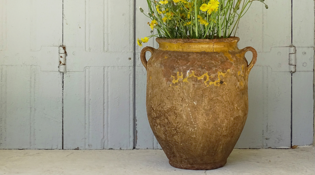 Antique French confit pot with yellow glaze and rich patina