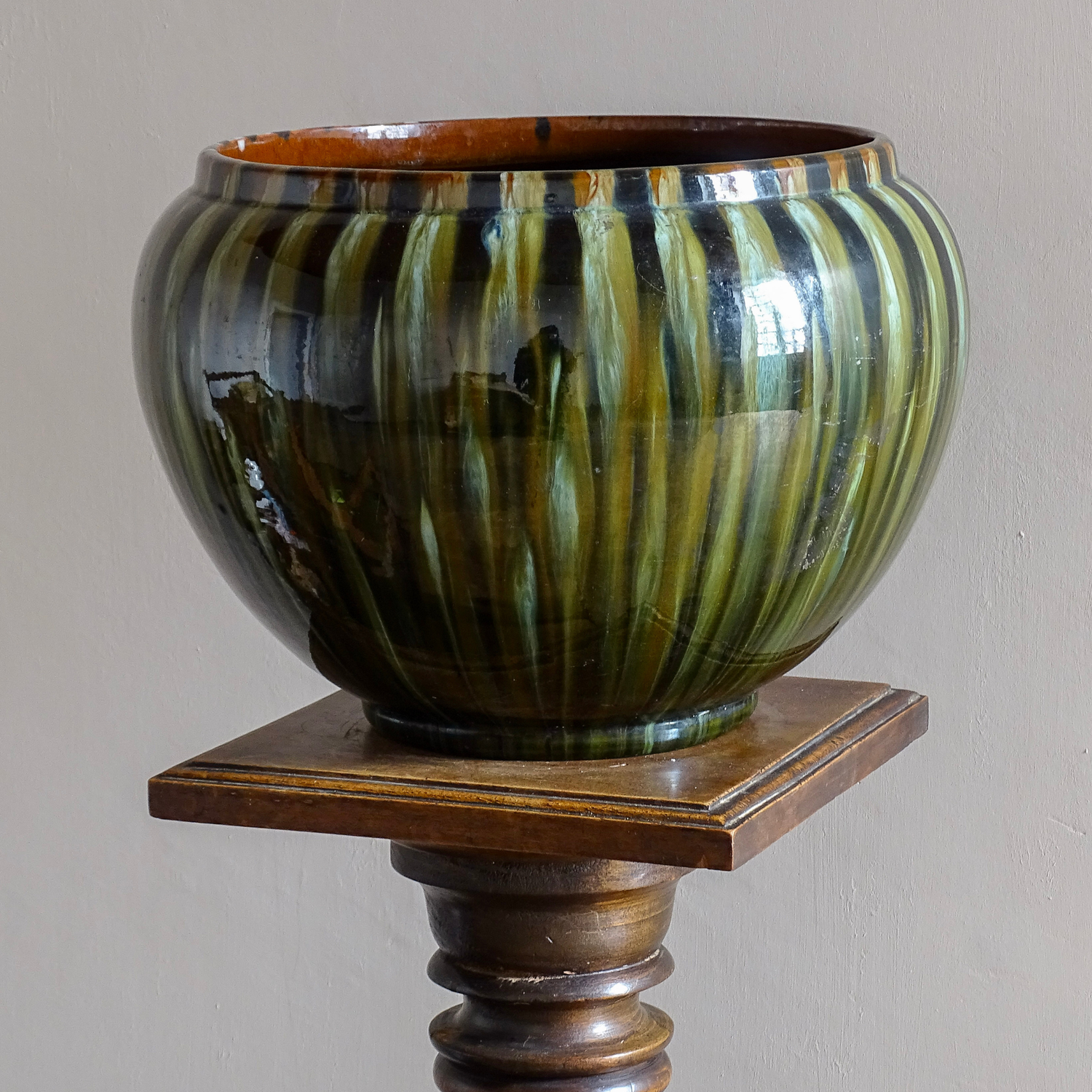 French antique ceramic cache pot or pottery planter on a wooden pedestal 