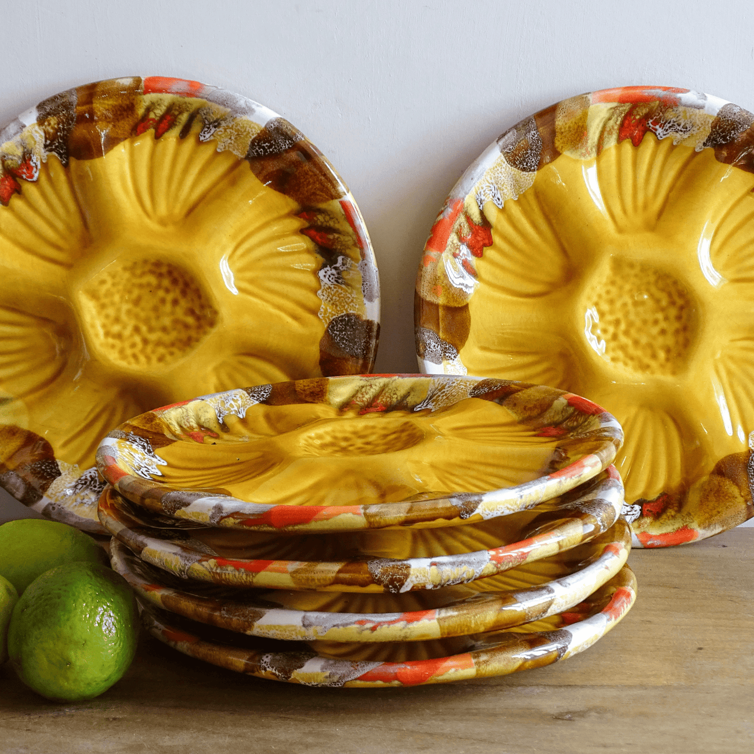 Collection of French vintage oyster plates with yellow glaze from Vallauris