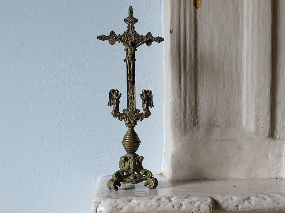 French antique brass altar cross from the 18th century, flanked by angels 