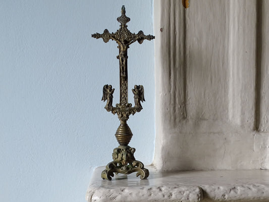 French antique brass altar cross from the 18th century, flanked by angels 