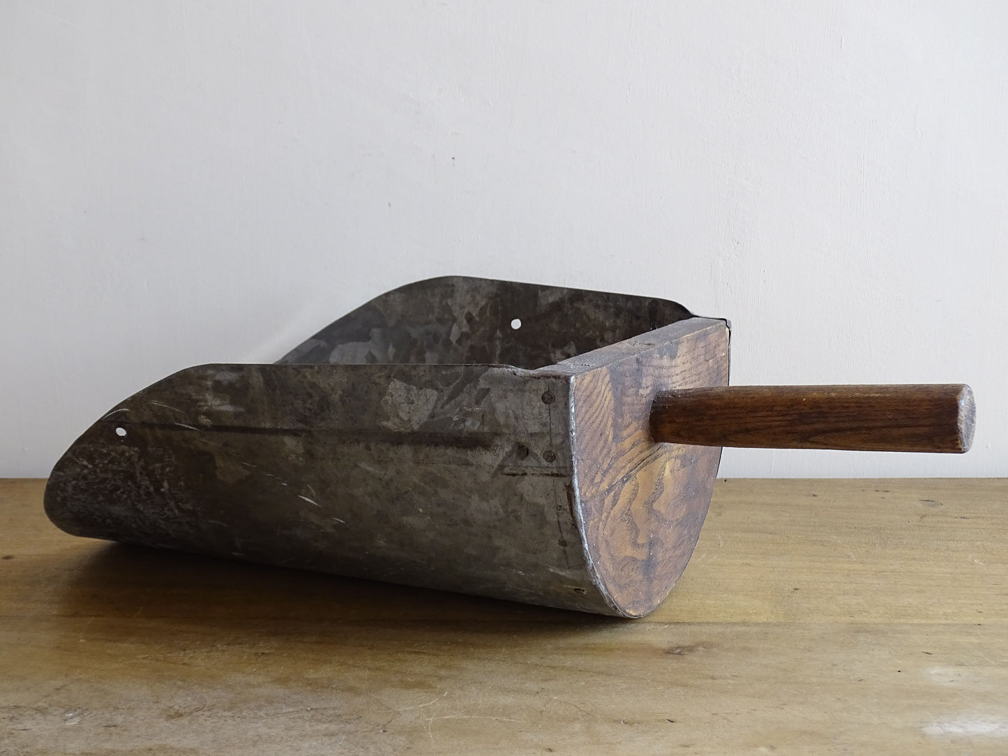 French antique grain scoop in galvanised metal with a wooden handle