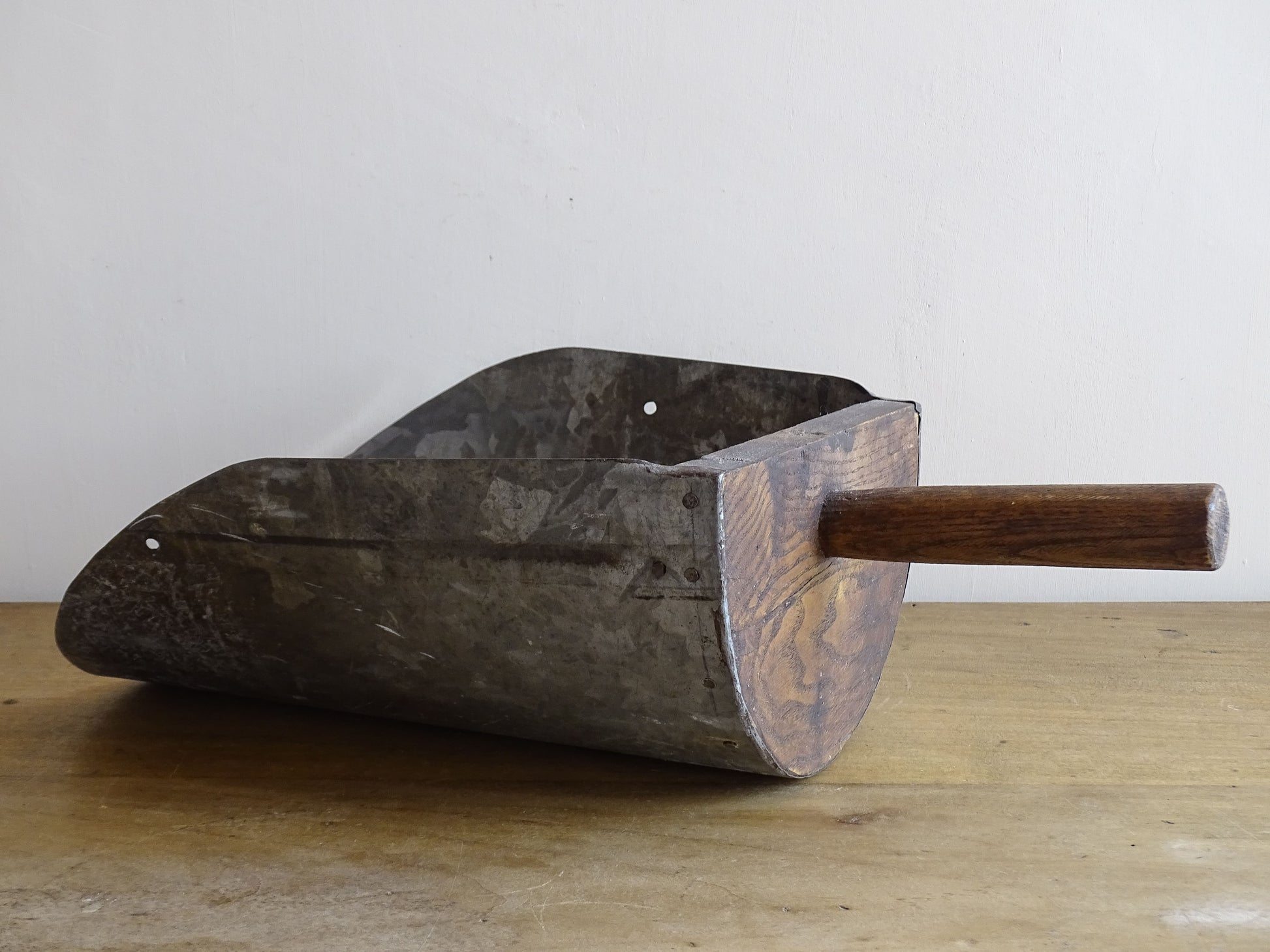 French antique grain scoop in galvanised metal with a wooden handle