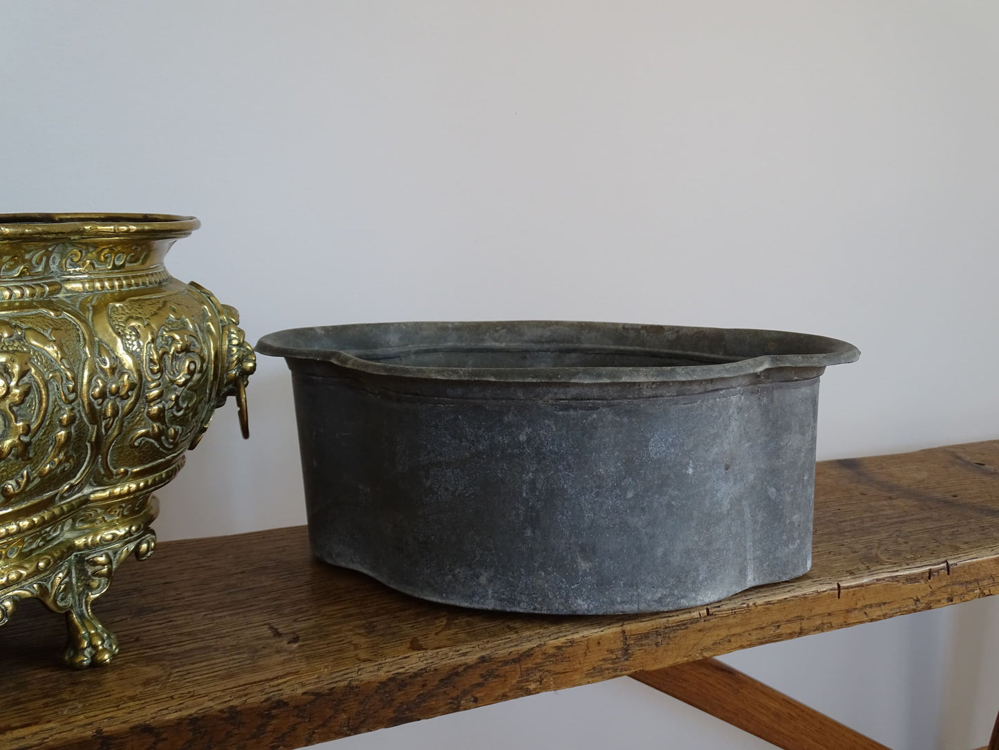 French antique brass jardinière with lion head handles and claw feet