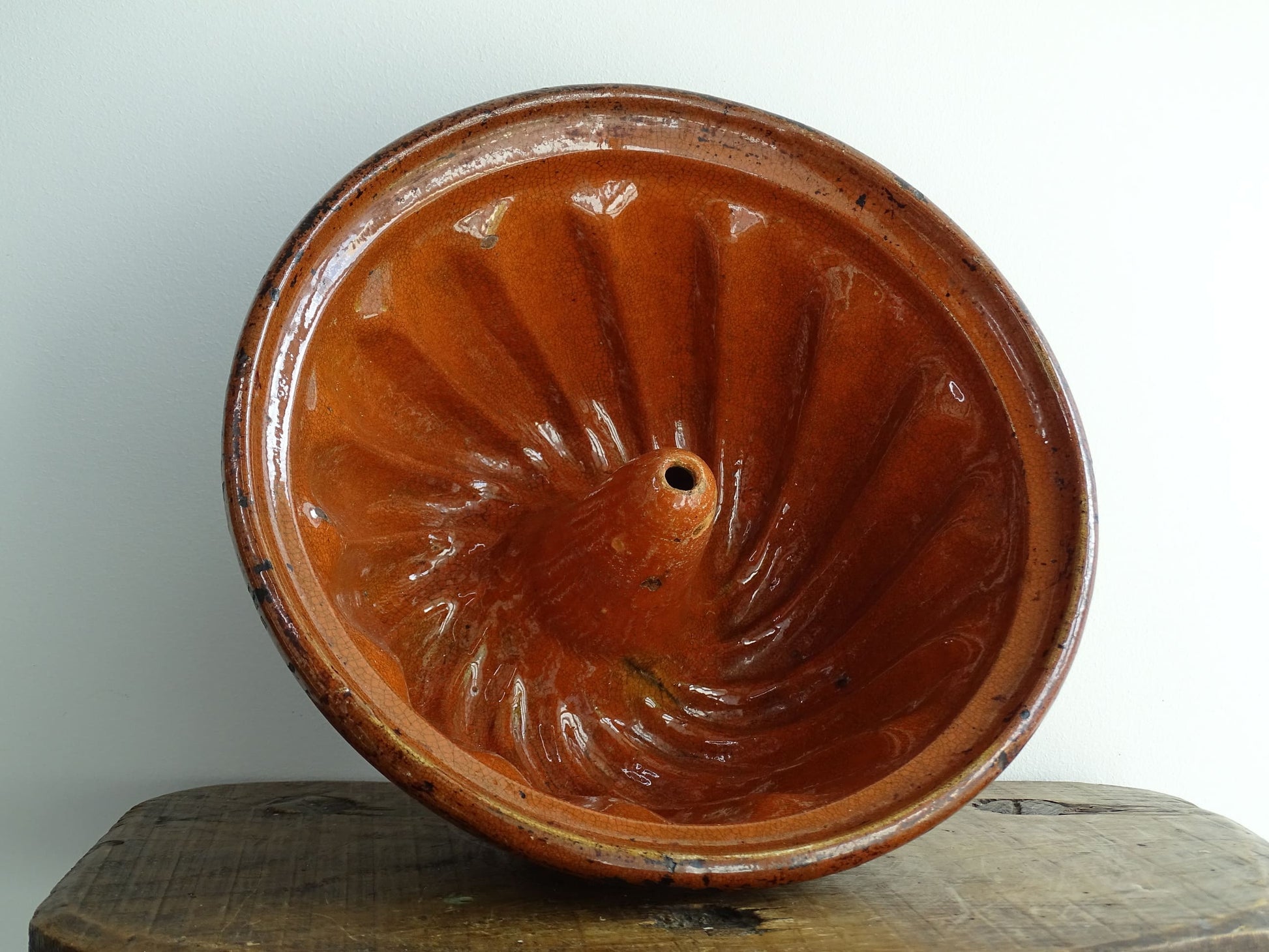 French antique Kougelhopf Mould from Alsace with deep orange glaze